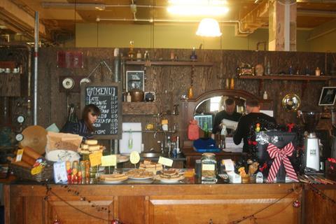 The cafe is a strong fixture and greets customers as they enter, while the stock is divided by gender and clothing type